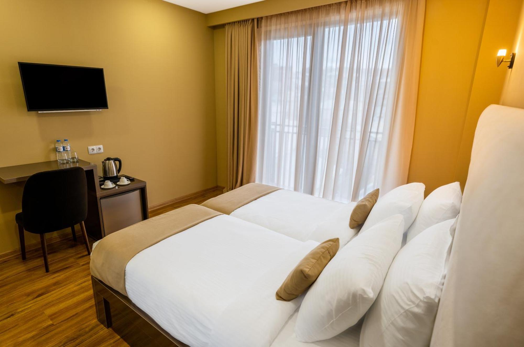 Hotel Residence Plaza Tbilisi Quarto foto